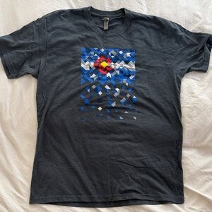 Men's Graphic T-Shirt - Charcoal Gray with Geometric Colorado Flag design.